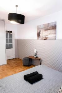Posteľ alebo postele v izbe v ubytovaní ClickTheFlat Constitution Square Apart Rooms