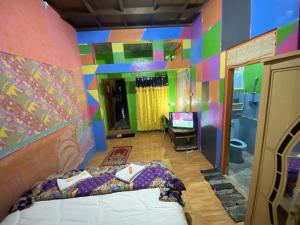Letto o letti in una camera di Pelemkecut Double-Degree Syariah Accommodation
