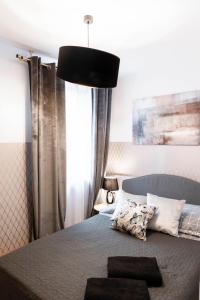 Posteľ alebo postele v izbe v ubytovaní ClickTheFlat Constitution Square Apart Rooms