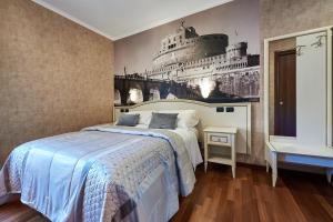 Ένα ή περισσότερα κρεβάτια σε δωμάτιο στο Le Suite Downtown