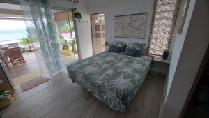 Fotografie z fotogalerie ubytování Studio Vaimiti pour 2 personnes vue mer et Moorea v destinaci Faaa
