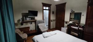 Postel nebo postele na pokoji v ubytování Guesthouse Kazakou