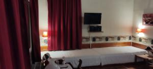 Postel nebo postele na pokoji v ubytování Guesthouse Kazakou