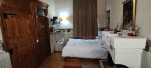Postel nebo postele na pokoji v ubytování Guesthouse Kazakou