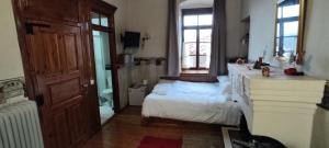 Postel nebo postele na pokoji v ubytování Guesthouse Kazakou