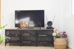 Telewizja i/lub zestaw kina domowego w obiekcie AT Trajano 6