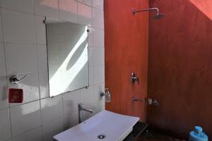 Koupelna v ubytování Amraness Luxury Resort Sasan Gir