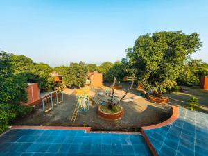 Zahrada ubytování Amraness Luxury Resort Sasan Gir + 37 fotografií