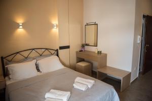 A bed or beds in a room at Musses House