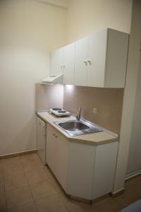 A kitchen or kitchenette at Musses House