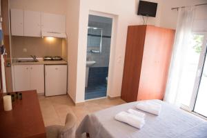 A kitchen or kitchenette at Musses House