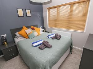 Postel nebo postele na pokoji v ubytování Driftwood Lodge