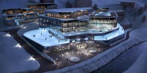 a large building with a rink in front of it at Astellina hotel-apart in Ischgl