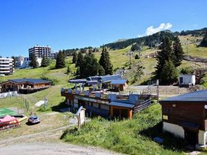 an aerial view of a train station on a hill at Appartement Chamrousse, 2 pièces, 6 personnes - FR-1-549-49 in Chamrousse