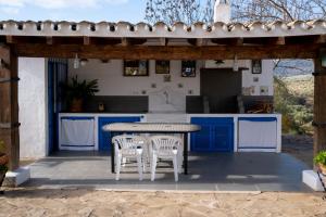 Zdjęcie z galerii obiektu La Mejorana Refugio andaluz con piscina entre olivos w mieście Villanueva de Tapia