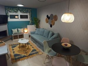 A seating area at Le Petit Jardin #2
