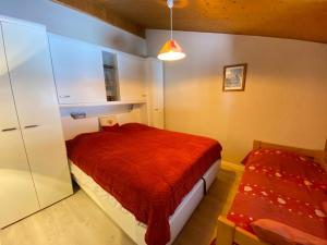 Posteľ alebo postele v izbe v ubytovaní Appartement chaleureux près du domaine skiable du Linga, Multi Pass été à 3€/jour/personne - FR-1-693-18