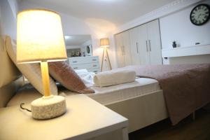 Postel nebo postele na pokoji v ubytování Apartment Elbasan city center 2