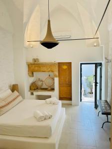 A bed or beds in a room at Corte Manfredi