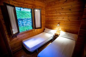 Postel nebo postele na pokoji v ubytování Camping Valle de Bujaruelo