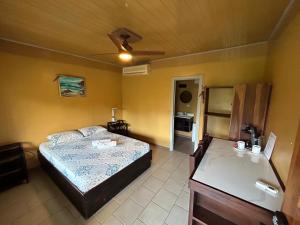 Postelja oz. postelje v sobi nastanitve Hotel Ticozuma
