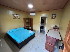 Postelja oz. postelje v sobi nastanitve Hotel Ticozuma