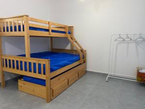 Ένα ή περισσότερα κρεβάτια σε δωμάτιο στο Kitão Canto do Forte