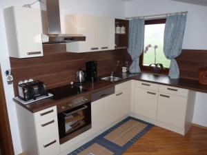 Kuchyňa alebo kuchynka v ubytovaní Chalet Anna Appartment