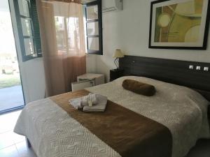 Postel nebo postele na pokoji v ubytování Gran Colonial Riviera