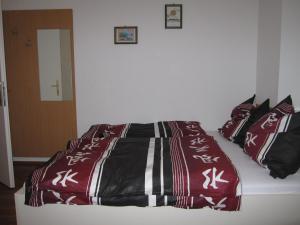 Postel nebo postele na pokoji v ubytování Pension Casa Topolino