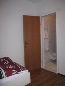 Postel nebo postele na pokoji v ubytování Pension Casa Topolino
