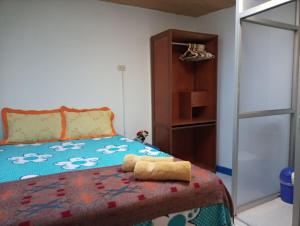 Postel nebo postele na pokoji v ubytování Posada Azul Cusco