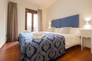 Cama o camas de una habitación en Autèntic Eixample Barcelona