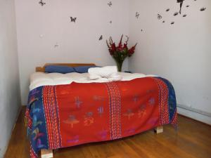 Postel nebo postele na pokoji v ubytování Posada Azul Cusco