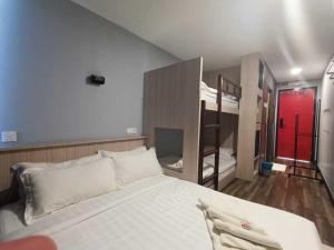 Postel nebo postele na pokoji v ubytování Boxinn The Kontena Home