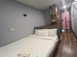 Postel nebo postele na pokoji v ubytování Boxinn The Kontena Home