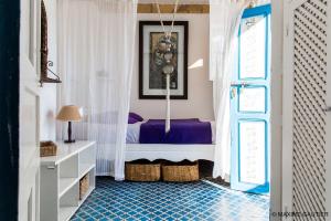 Postel nebo postele na pokoji v ubytování Hôtel Emeraude Essaouira