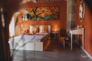 Voodi või voodid majutusasutuse Le Temple d'Opaline toas
