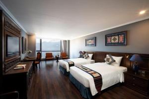 Postel nebo postele na pokoji v ubytování Pistachio Hotel Sapa