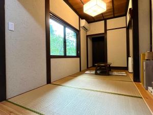 Voodi või voodid majutusasutuse 農家民宿 山いちご toas