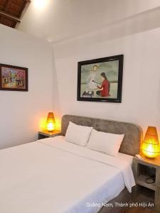 Postel nebo postele na pokoji v ubytování BOBE Homestay