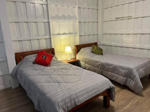 Postel nebo postele na pokoji v ubytování เพชรบูรณ์ แอทโฮม