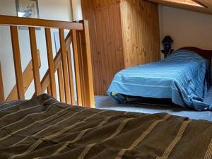 Posteľ alebo postele v izbe v ubytovaní Appartement 2 pièces proche plage à Dolus d'Oléron – 4 couchages, balcon, parking, local vélo - FR-1-246A-151