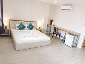 Postel nebo postele na pokoji v ubytování Prinz Garden Villa