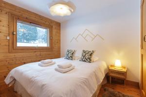 Katil atau katil-katil dalam bilik di Cottage des Houches - Happy Rentals