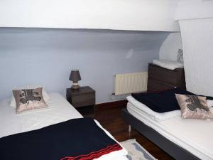Tempat tidur dalam kamar di Maison Perros-Guirec, 4 pièces, 6 personnes - FR-1-368-62
