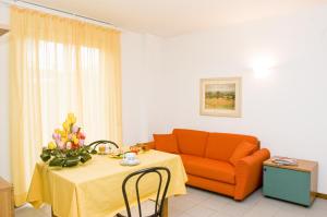 A seating area at Residence Il Monello