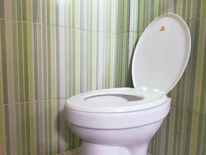 Ein Badezimmer in der Unterkunft Inawa Homestay Syariah
