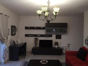 Setusvæði á Village Corner 3 bedroom apartment with Garage