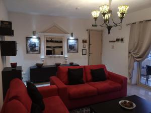 Setusvæði á Village Corner 3 bedroom apartment with Garage